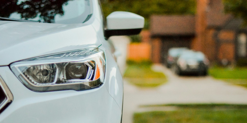 A white car and its headlight; extended warranty image
