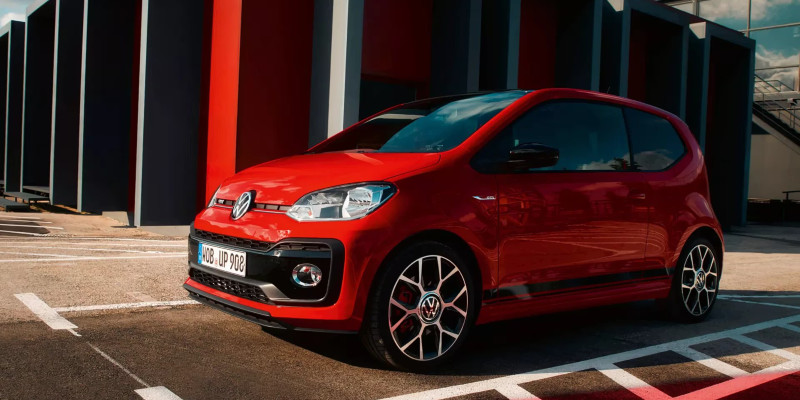 A red Volkwagen UP GTi